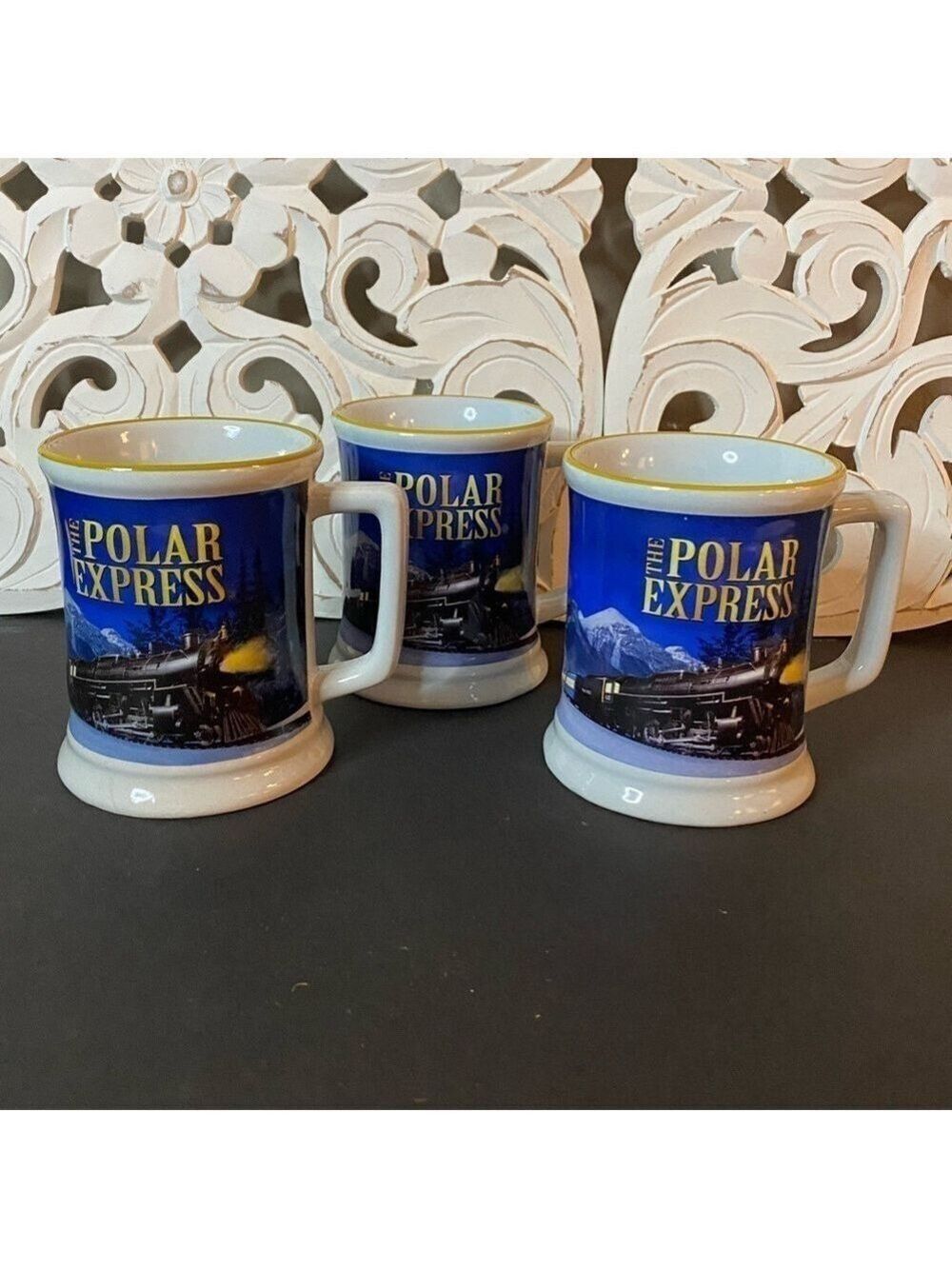 (3) Polar Express Coffee Hot Chocolate Mugs Set Of 3 Mugs. 
Nice quality mugs